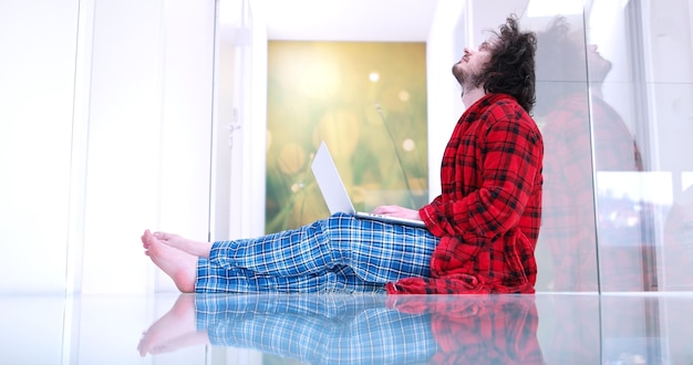 A split image showing a person working on a laptop on one side and relaxing during retirement on the other. The image should represent the balance between working and receiving Social Security benefits.